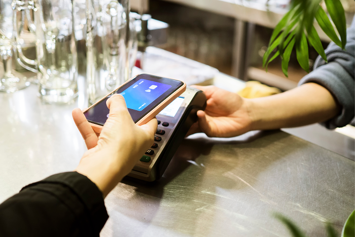 Phone tapping a payment machine