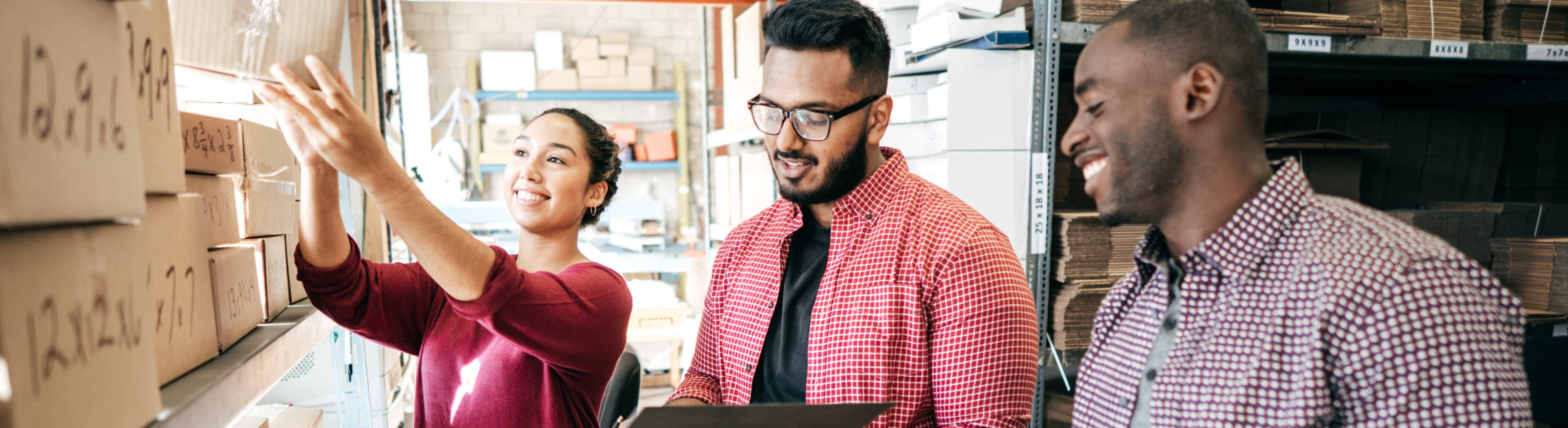 guy looking at computer and lady pointing