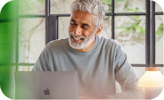 Older man using a laptop computer